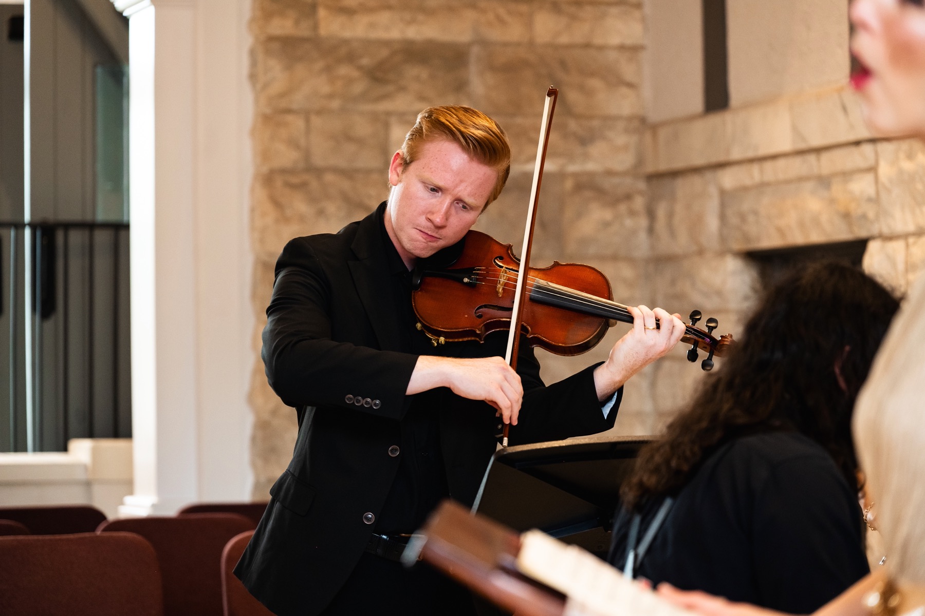 Adam Moore performing violin